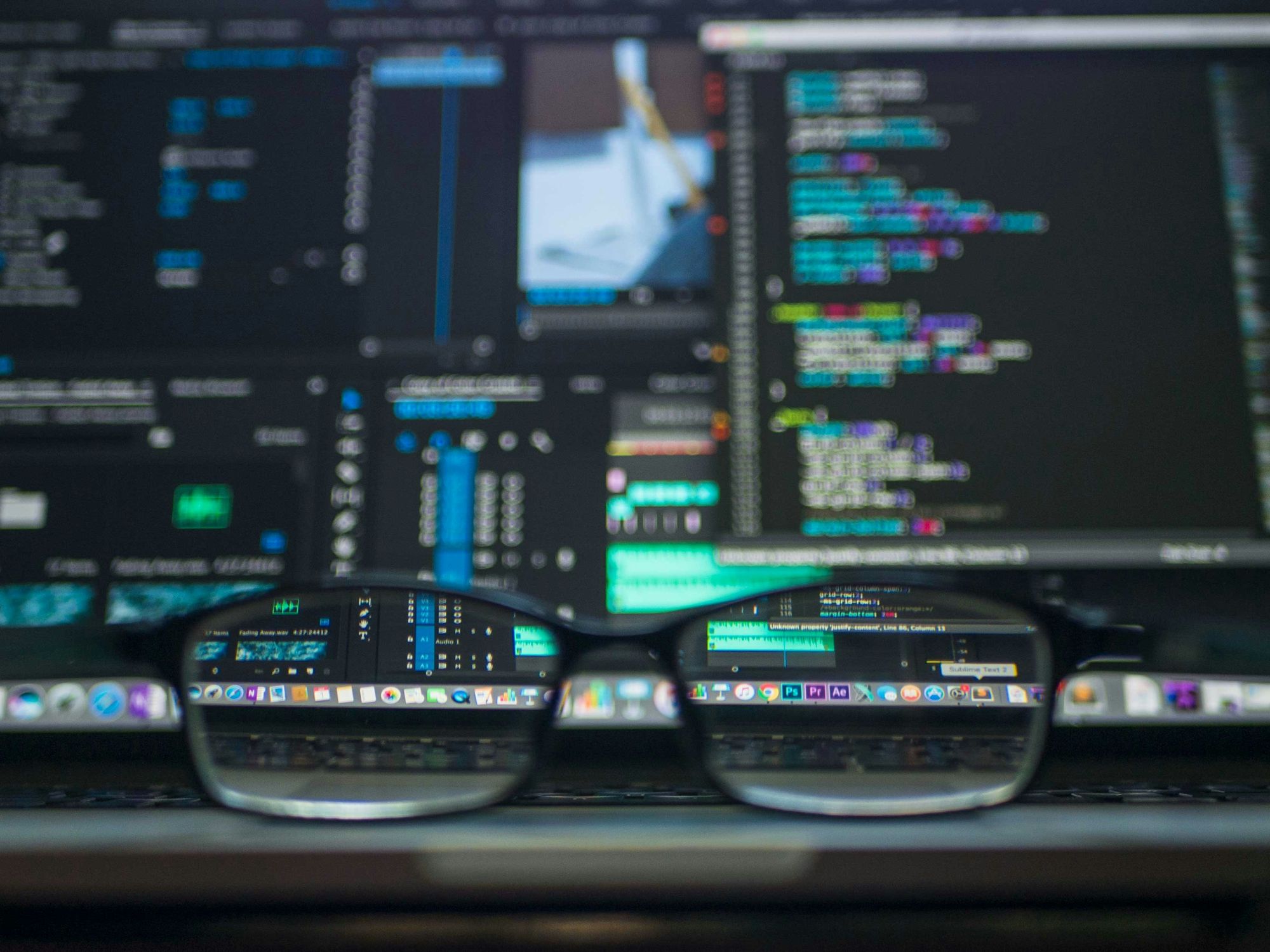 glasses infront of coding screen - What Is SSML
