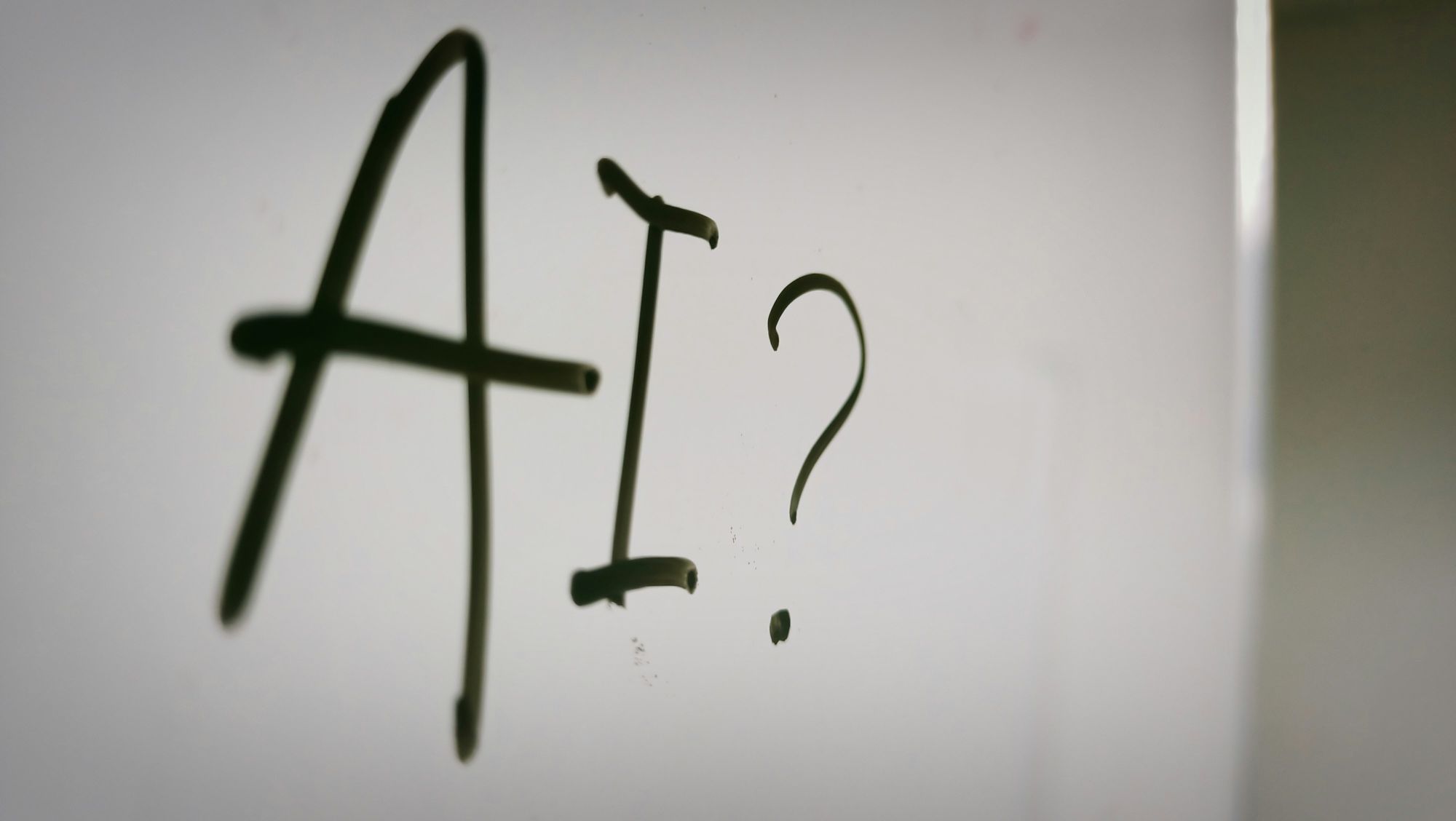AI written with a question mark - Murf.AI API